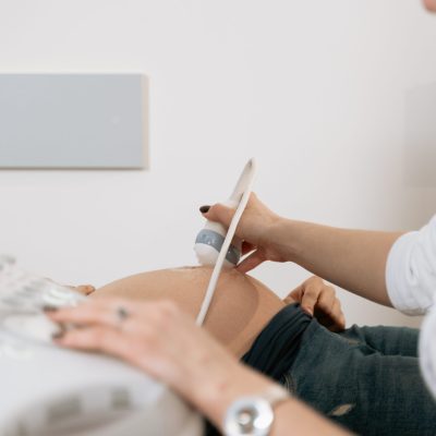 pexels-mart-production-7089333 Image of OB ultrasound being performed.